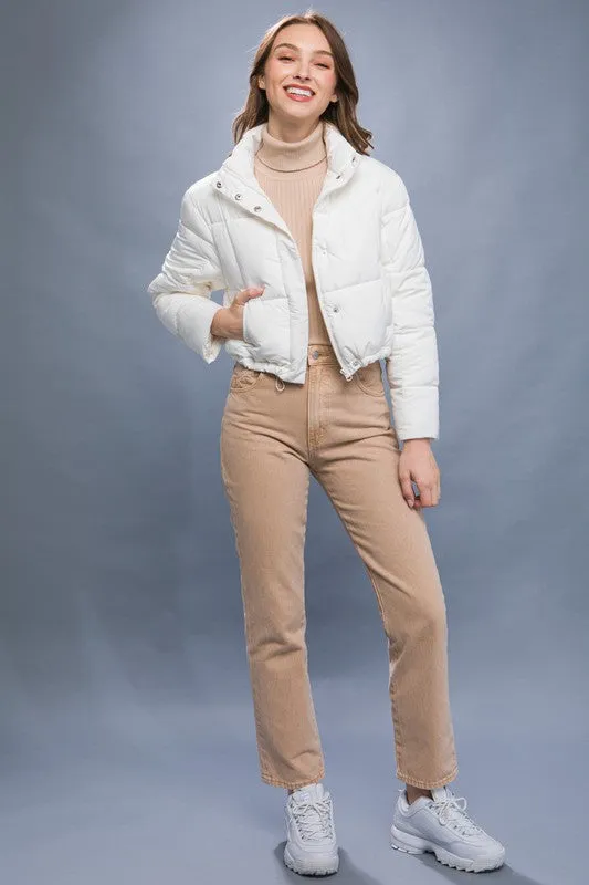 Ivory Puffer Jacket with Zipper and Snap Closure